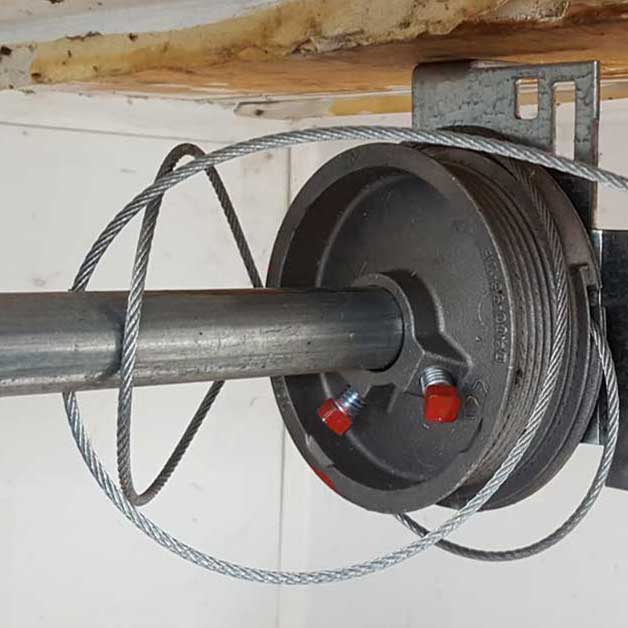 jammed garage door cable